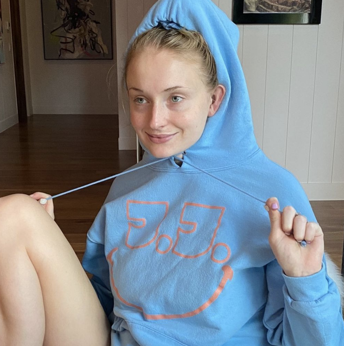 Sophie wearing a hoodie