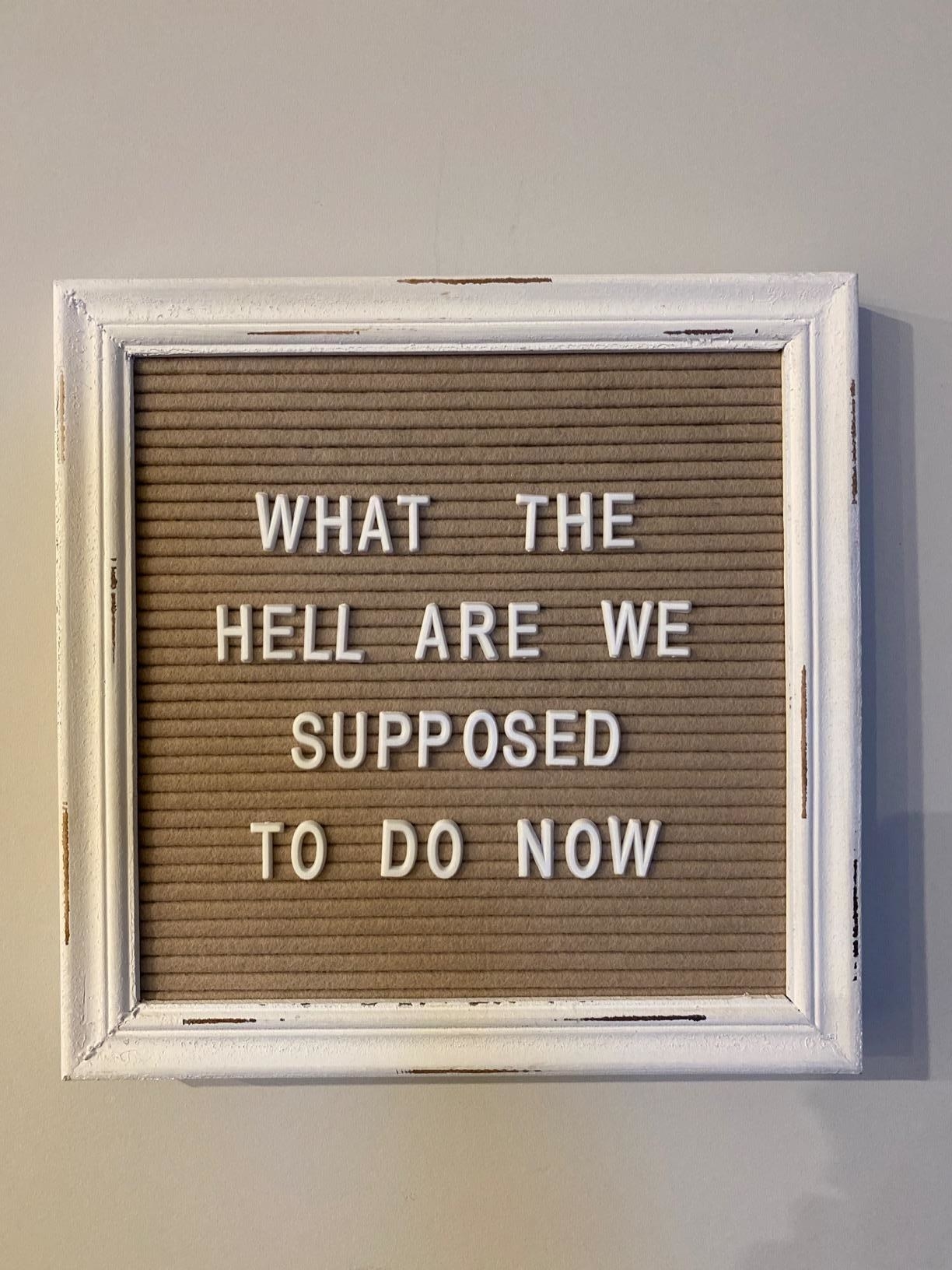 reviewer image of a cappuccino felt board with the message &quot;what the hell are we supposed to do now&quot;