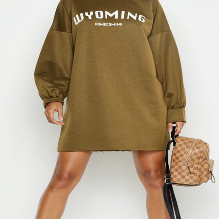 model holding mini backpack