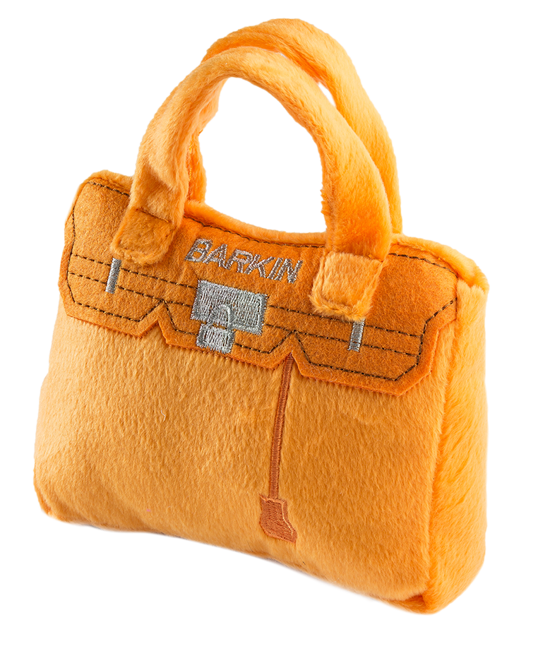 the orange bag which is styled like a Burkin