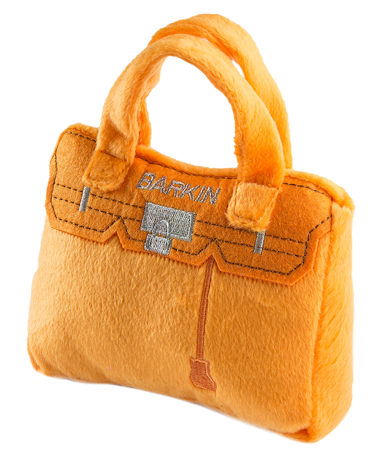 the orange bag which is styled like a Burkin