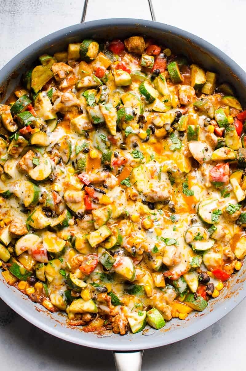 A cheesy chicken and zucchini skillet meal.