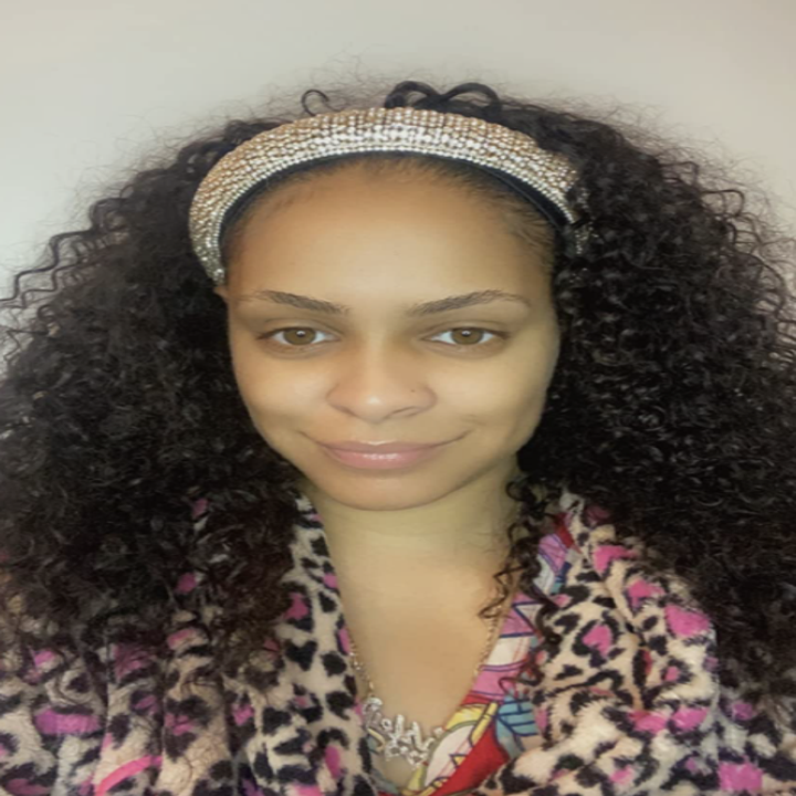 reviewer wearing sparkly headband