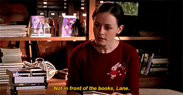 Rory telling Lane not to do something in front of the books