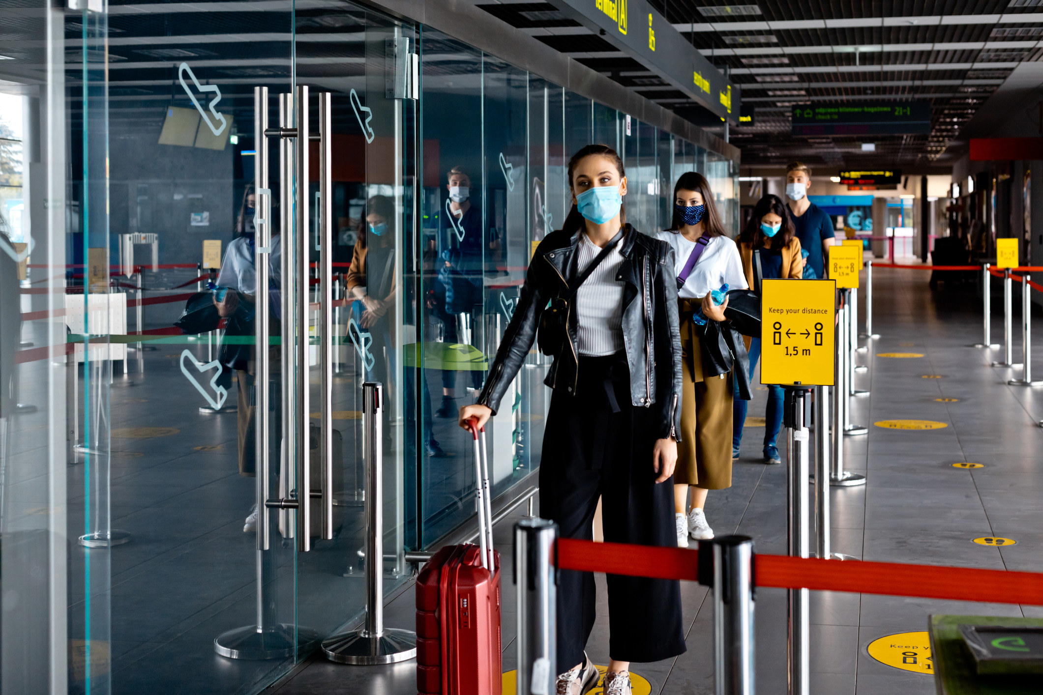 A bunch of people lined up at airport security