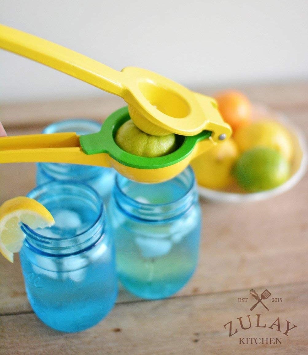 a yellow and green lemon squeezer