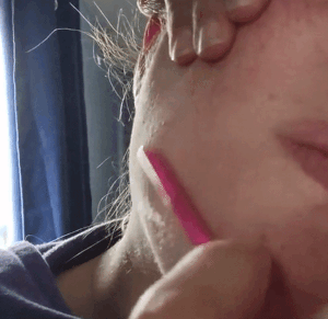 gif of reviewer using the touch-up tool to remove their peach fuzz 