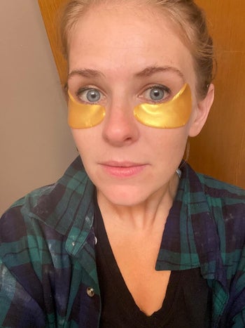 Reviewer wearing under eye patches by Le Gushe