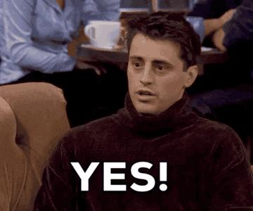 A gif of Joey Tribbiani from Friends pumping his fist and saying YES emphatically