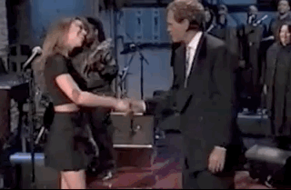Carey visibly uncomfortable as she tries to pull away from Letterman&#x27;s hand multiple times