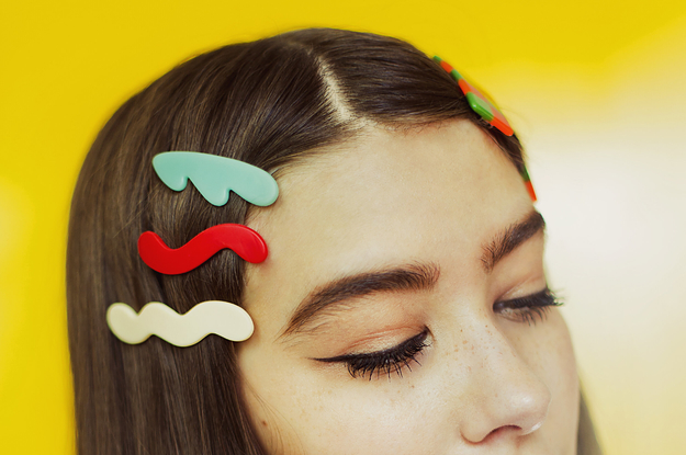 Model wearing three wavy barettes
