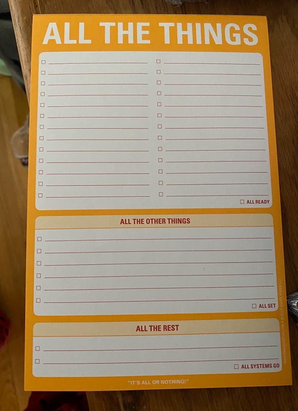 A reviewer photo of the notepad divided into three sections and labeled &quot;All the things&quot;. &quot;All the other things&quot;, and &quot;all the rest&quot; 