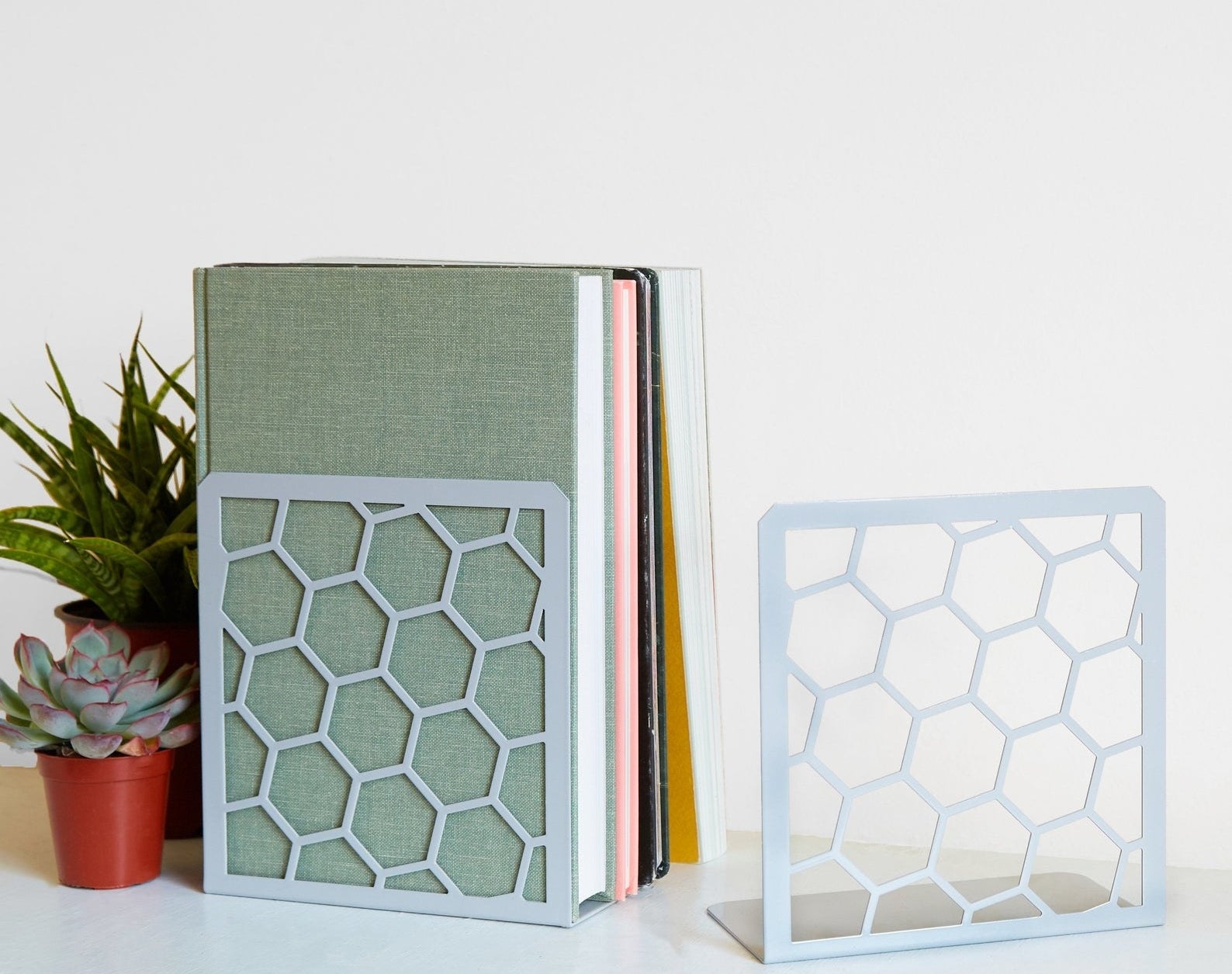 honeycomb book ends in pale blue