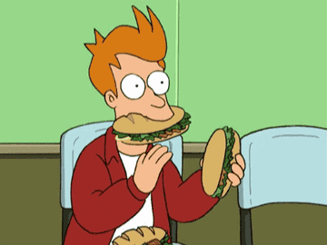 Philip from Futurama holding a sandwich and clapping