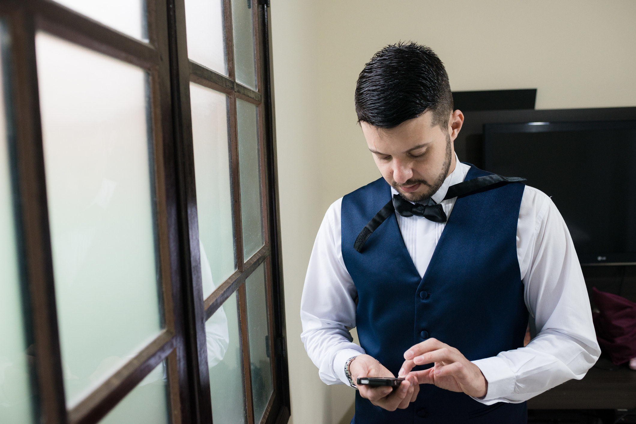 Groom texting