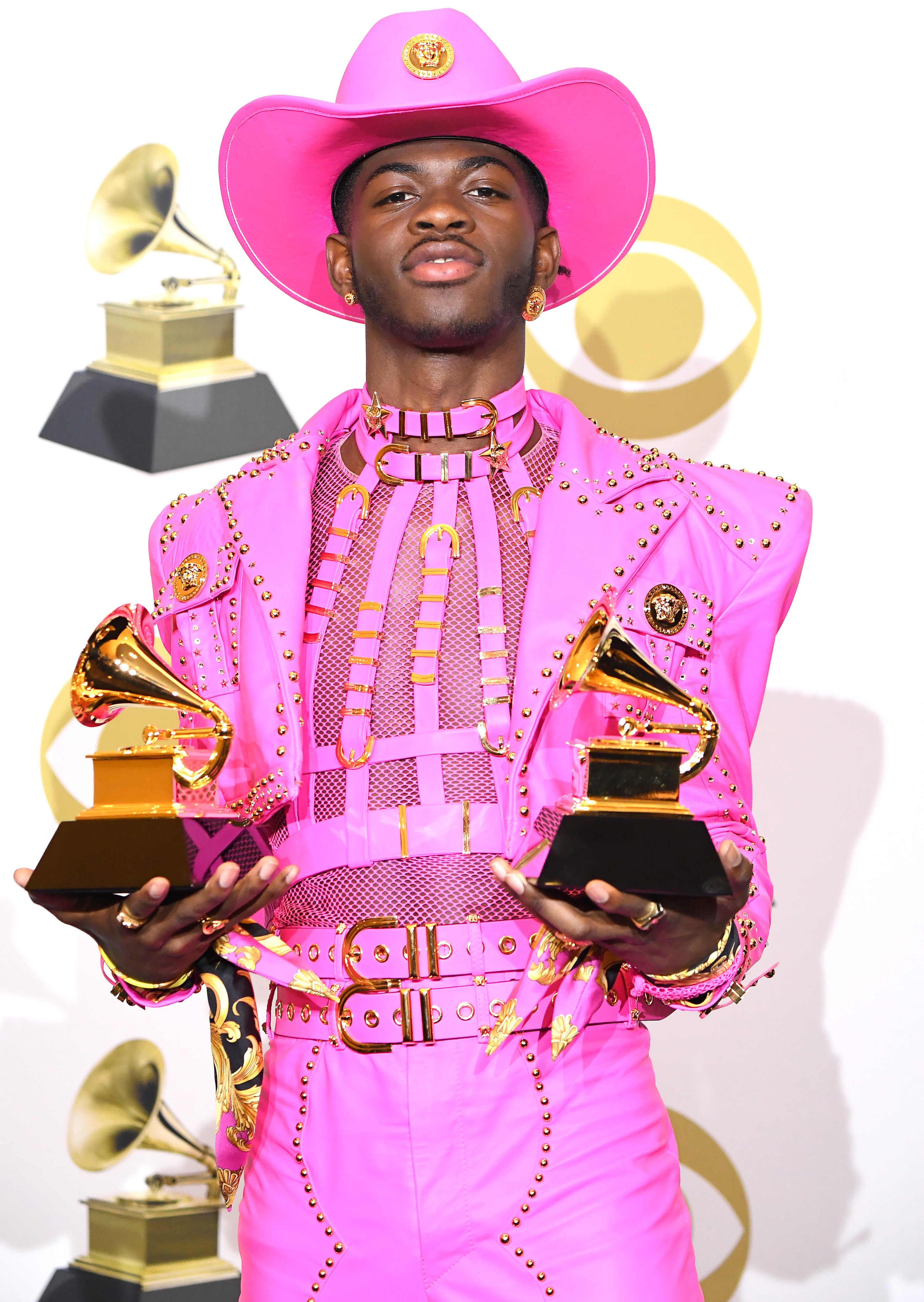 Lil&#x27; Nas X holding two Grammys