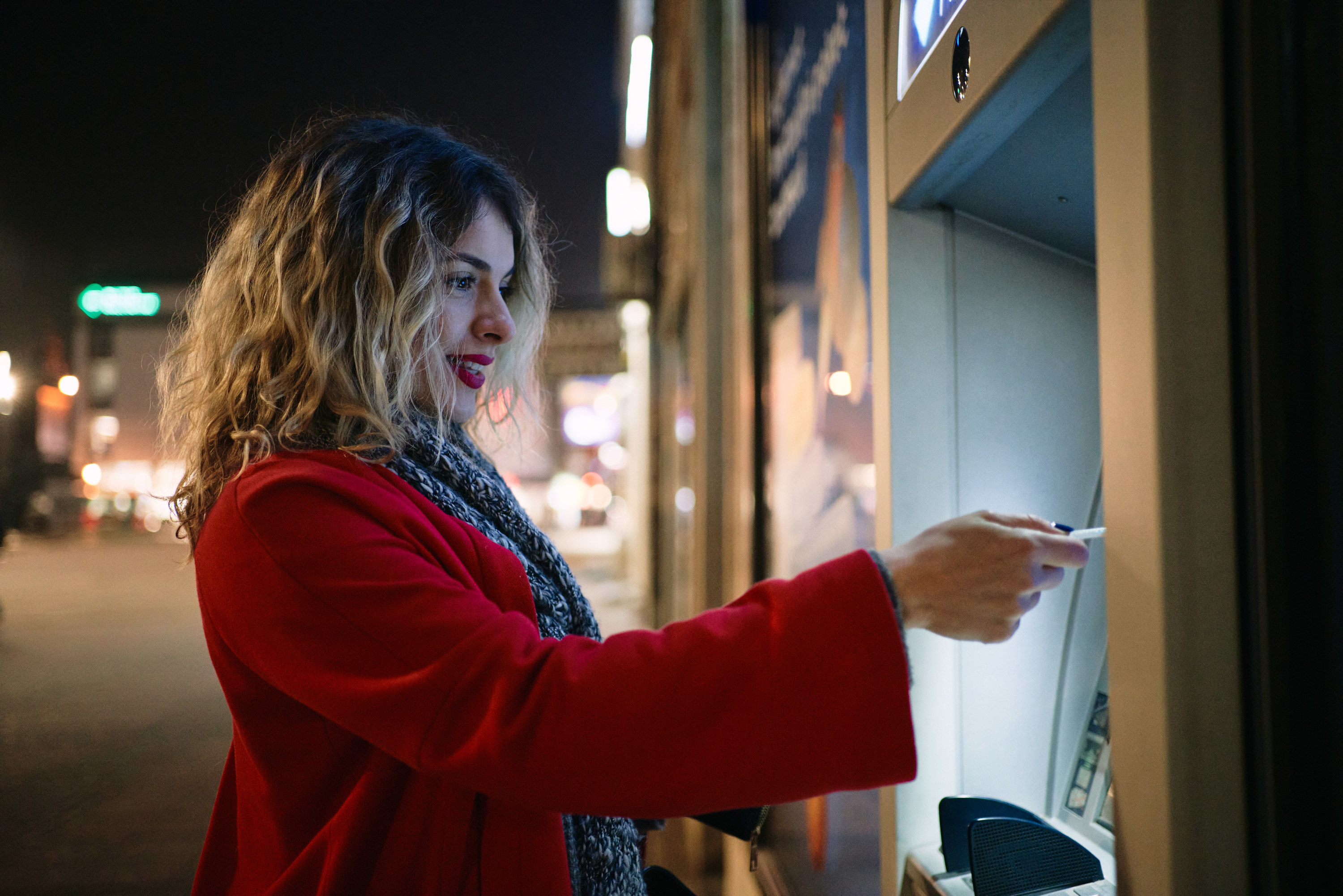 A woman at an ATM