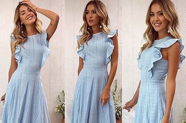 A model wearing the dress in blue