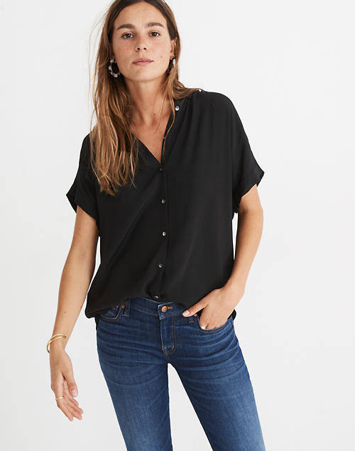 front view of a model wearing the shirt in black