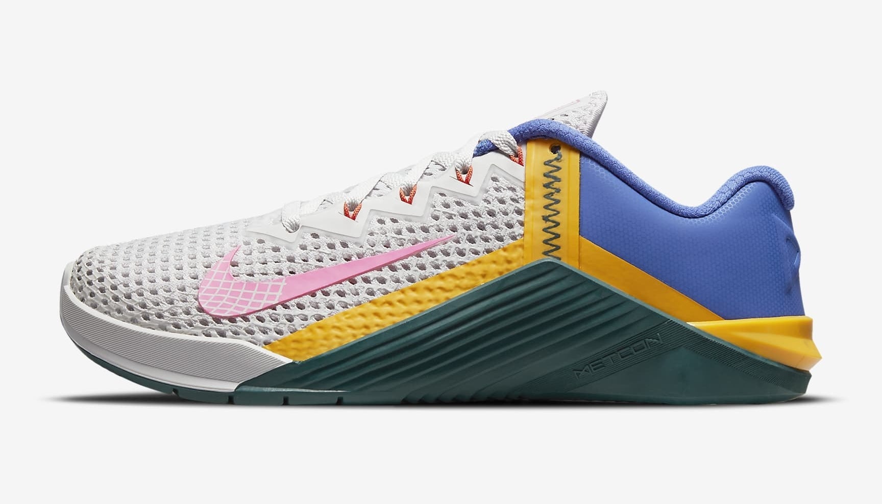 Nike Metacon 6 training shoe with white, blue, pink, yellow, and green detailing