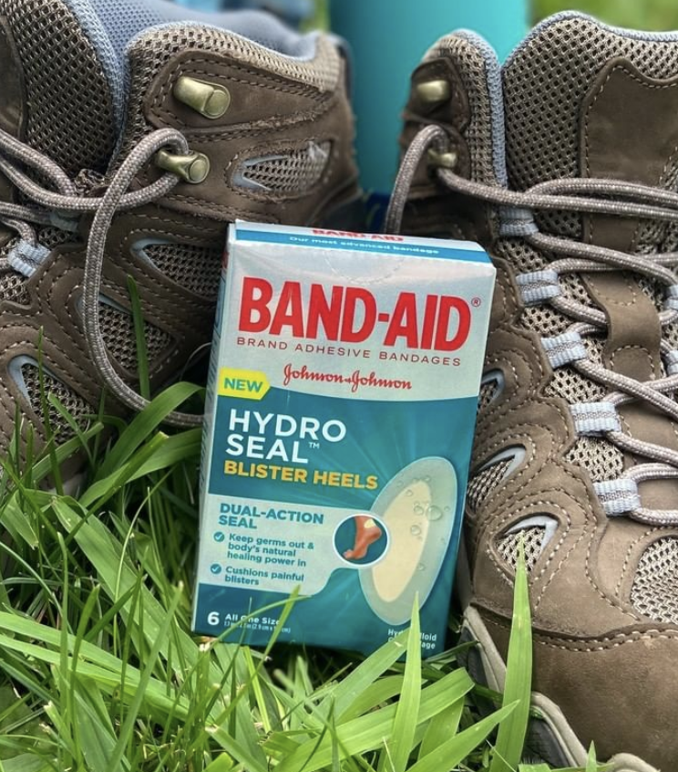 the bandaid pack next to a pair of hiking shoes
