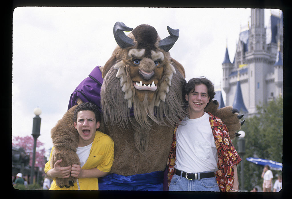 A photo of Cory and Shawn with Beast in front of Cinderella&#x27;s Castle taken for an episode of Boy Meets World