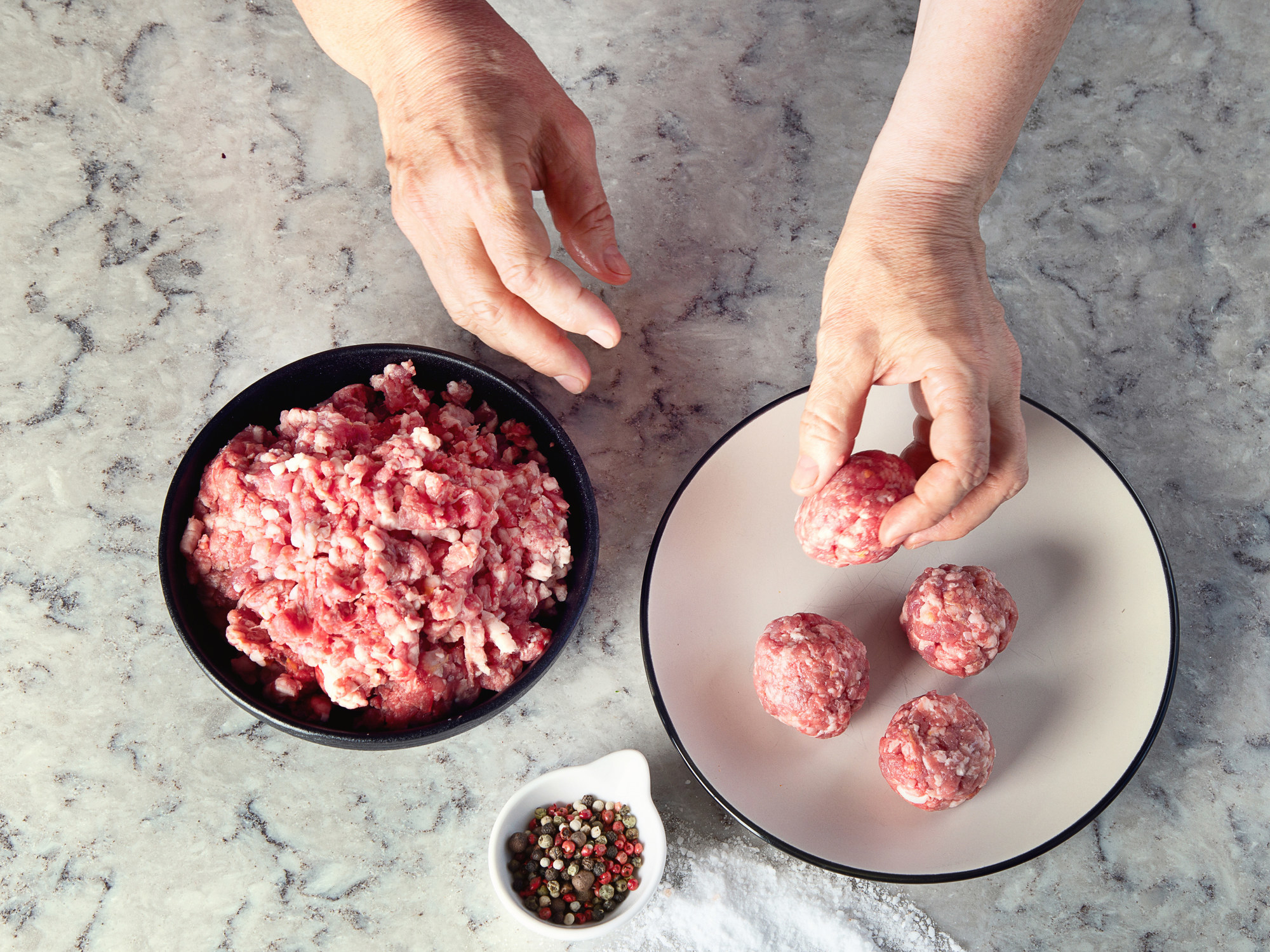 Making meatballs.