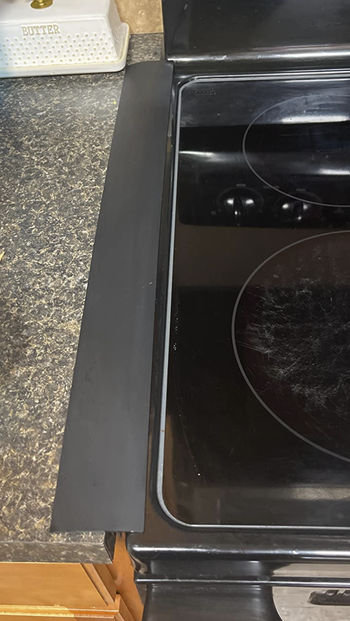 reviewer's picture of their crack cover, well, covering the crack. Ha!