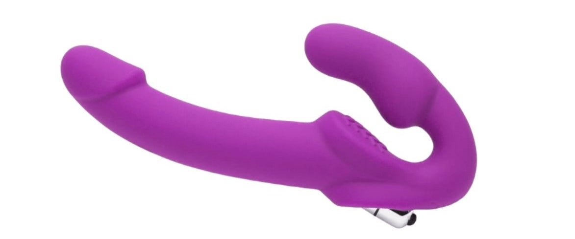 A purple strapless strap on