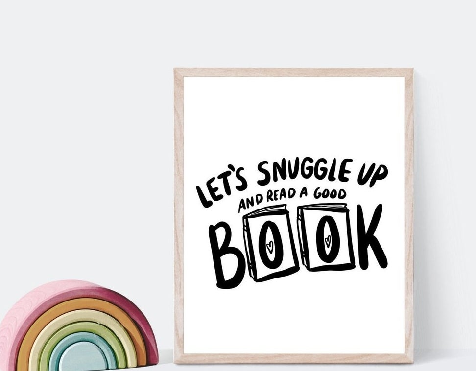 Black and white print that says &quot;Let&#x27;s snuggle up and read a good book&quot; 