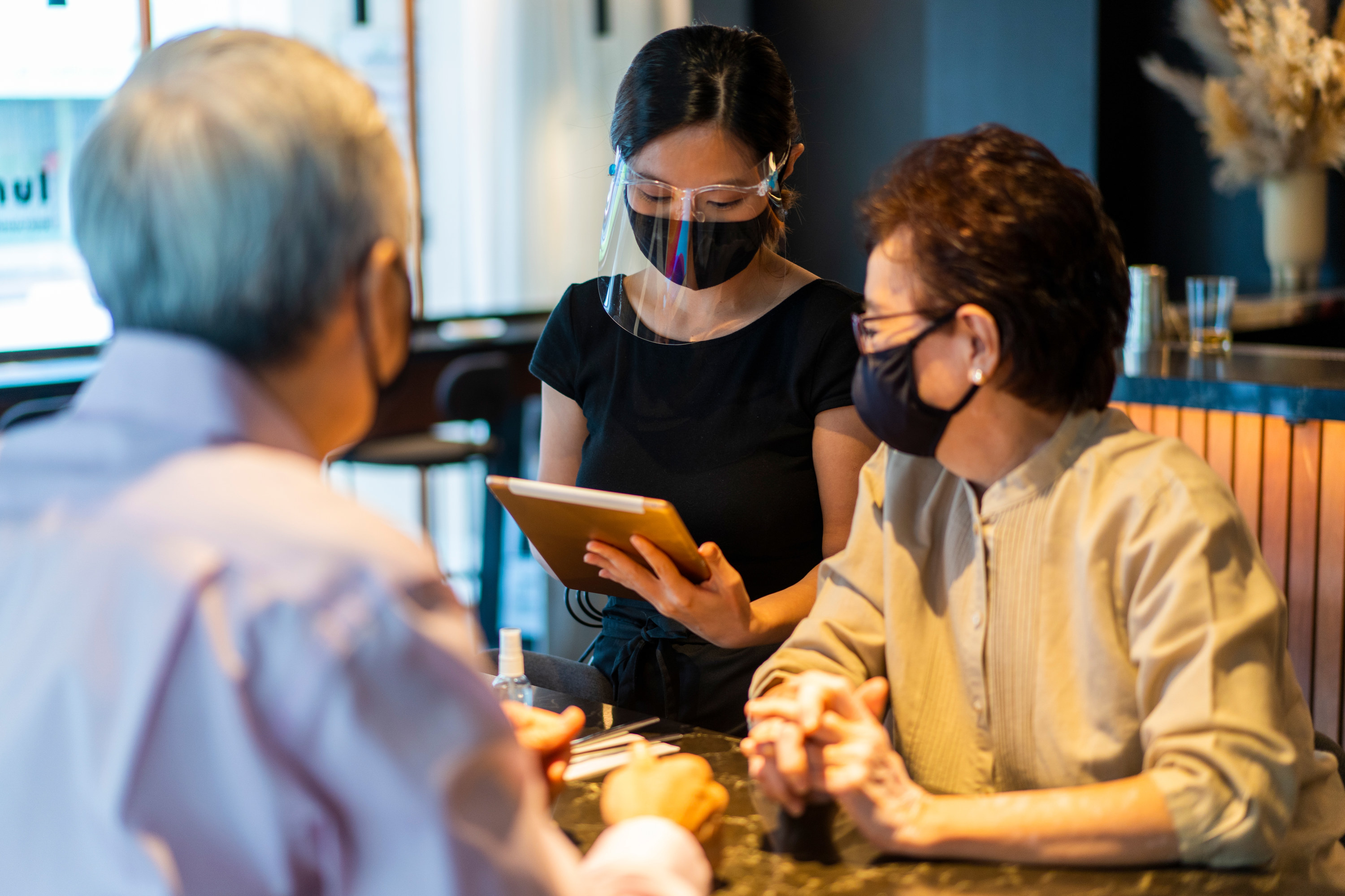 Elderly Asians In Restaurant