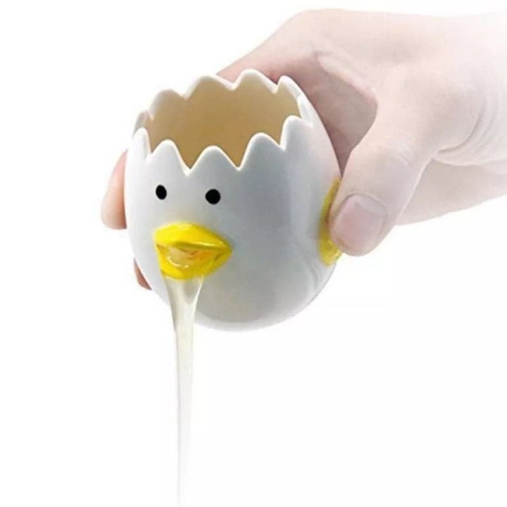 Model pouring egg whites from egg white separator