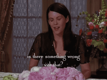 gif of Lauren Graham in the TV show &quot;Gilmore Girls&quot; saying &quot;Is there something wrong with that? no.&quot;