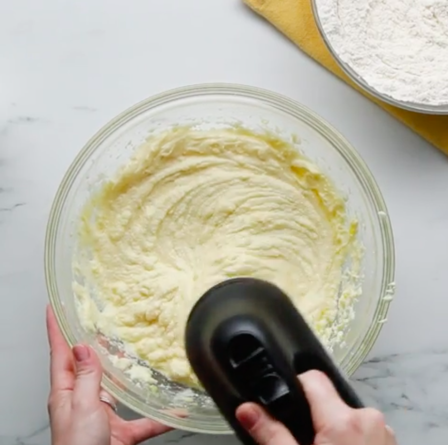 Lemon cake batter in a mixing bowl.