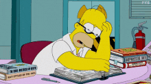 Homer Simpson flipping through a textbook
