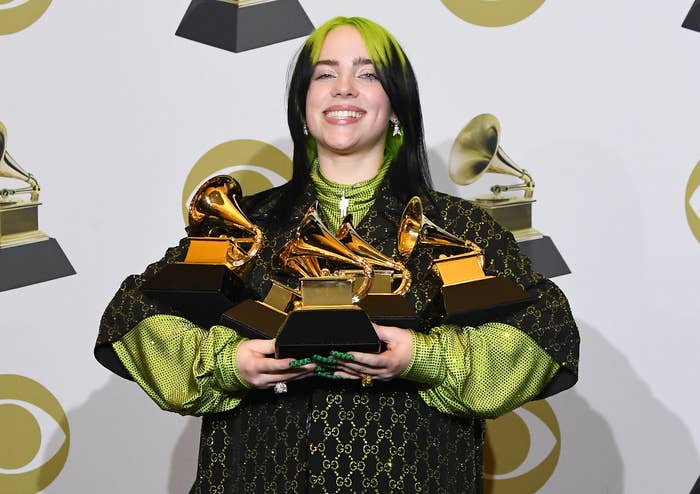 Billie holds up all of her Grammy awards