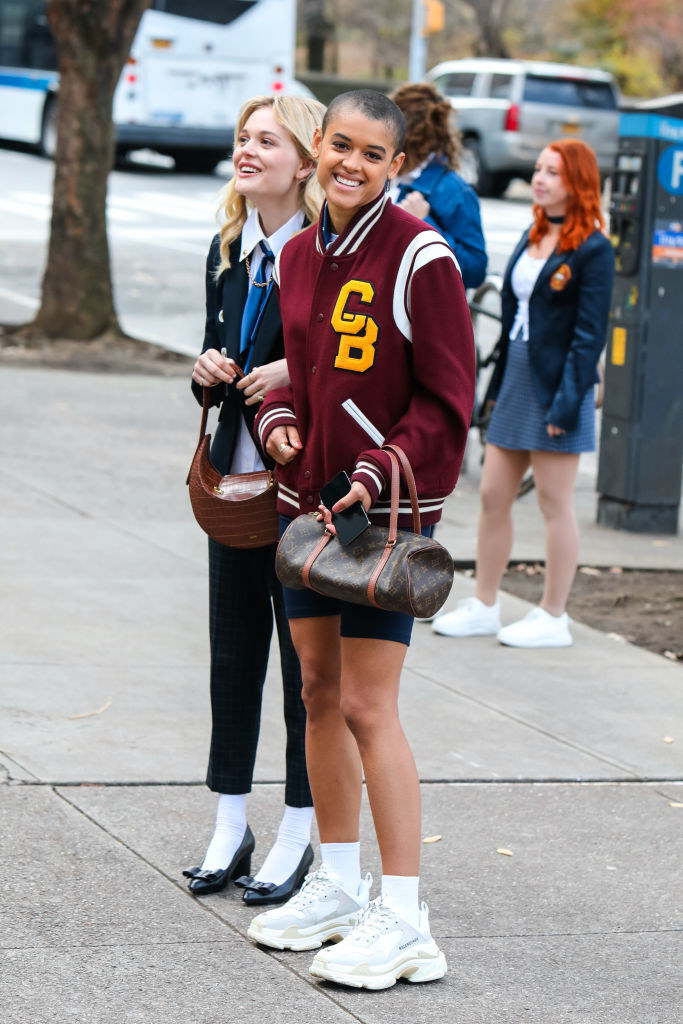 Emily Alyn Lind and Jordan Alexander are seen at the film set of the &#x27;Gossip Girl&#x27; on Fifth Avenue, Manhattan on December 01, 2020 in New York City