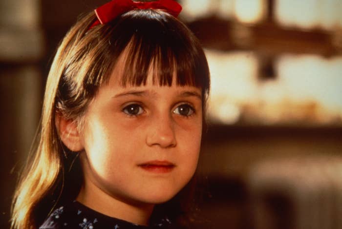 Mara Wilson in Matilda wearing a bow headband