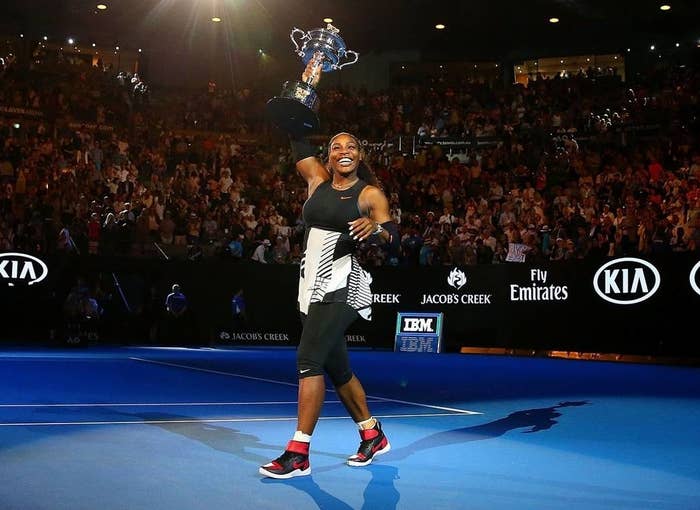 Serena Williams holding a trophy