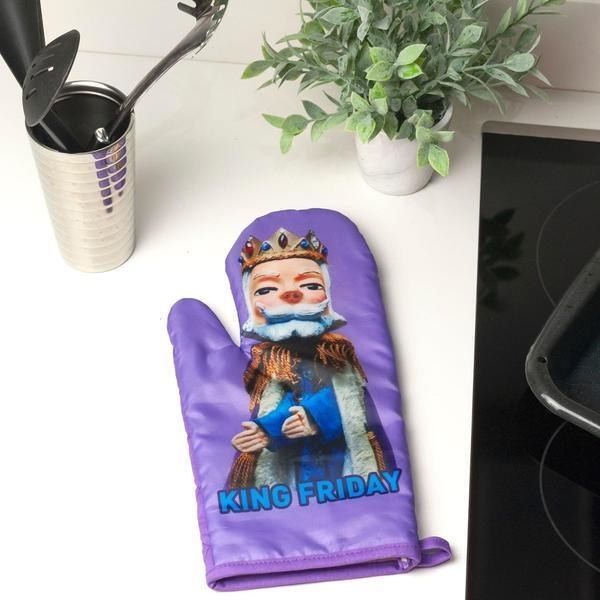Purple oven mitt with image of puppet King Friday on the front 