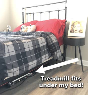 Genevieve Scarano showing the treadmill folded up and stored underneath her bed