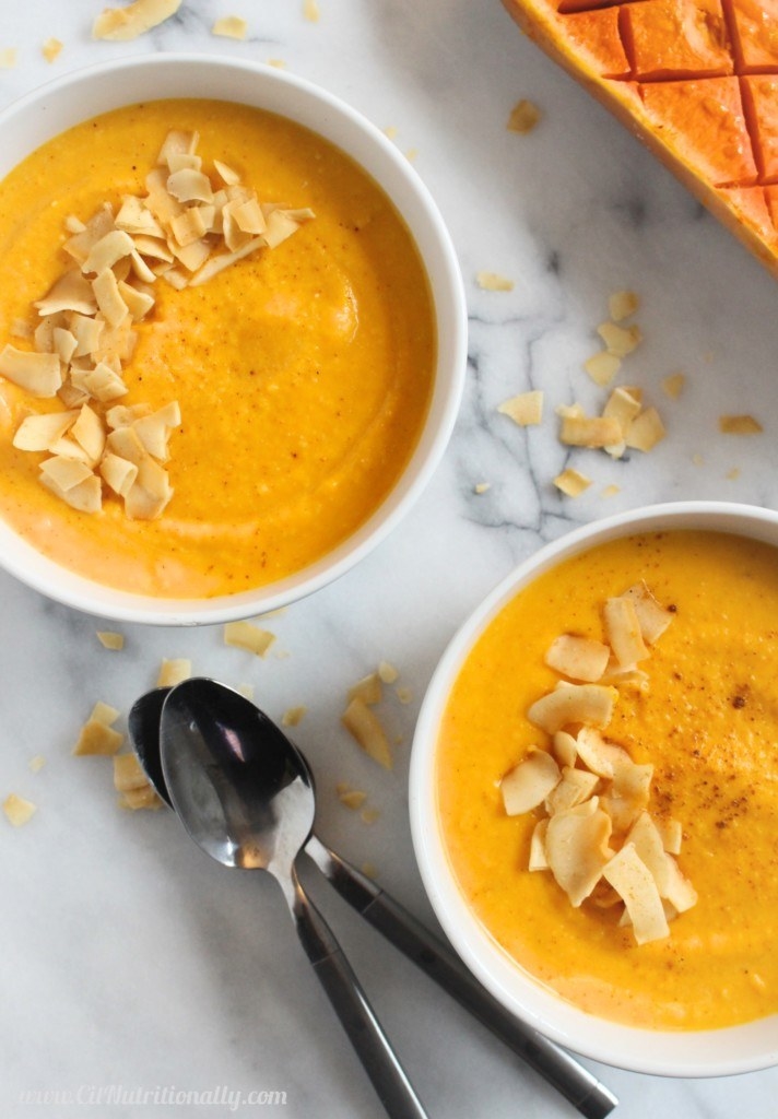 Two bowls of curried butternut squash soup.