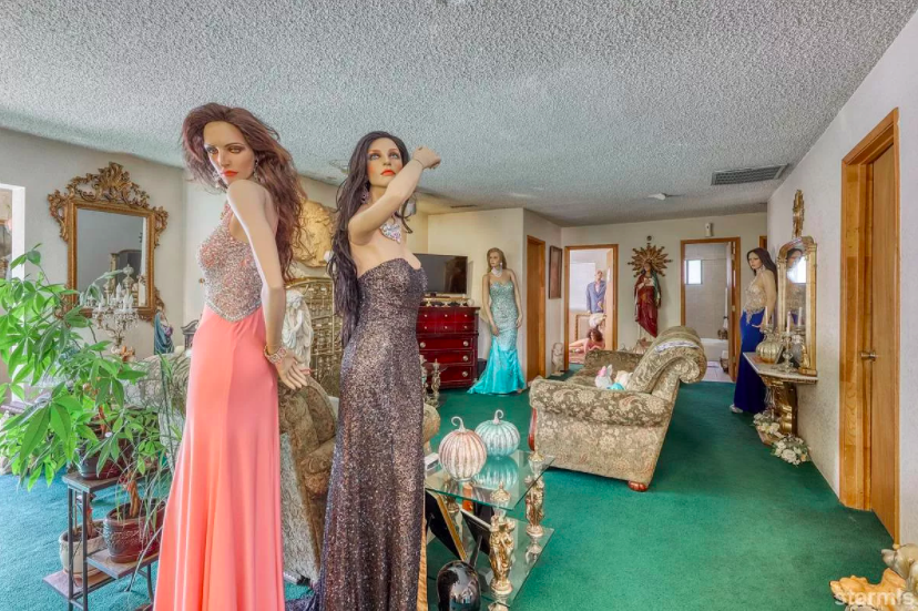 Several more female mannequins dressed in a long wigs and sequined evening gowns of various colors and styles