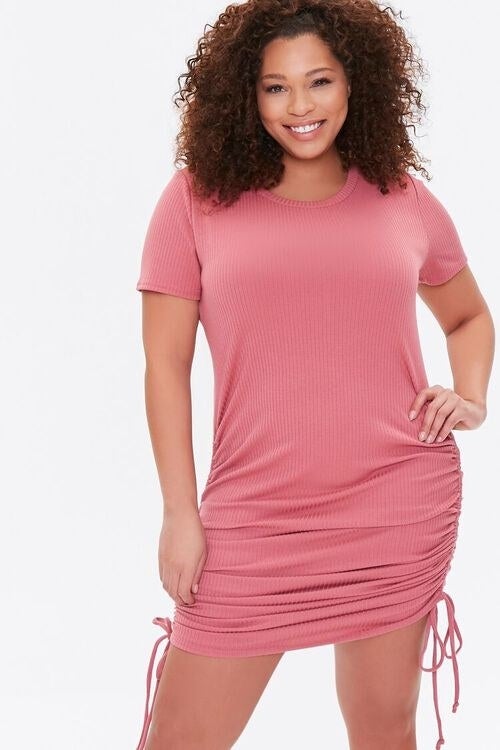 Model wearing pink dress