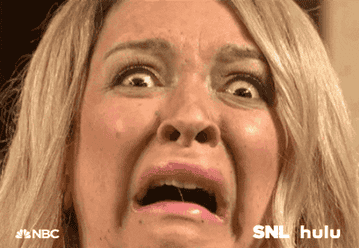 Maya Rudolph making a close-up scared face on SNL