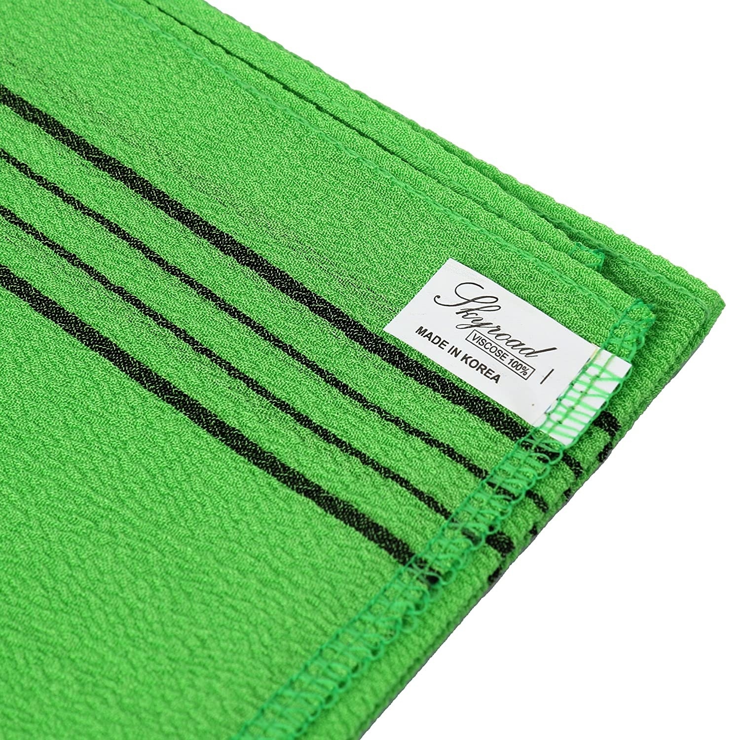 a close-up photo of the green exfoliator