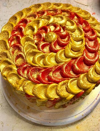 another reviewer's cake with shimmery gold all over it