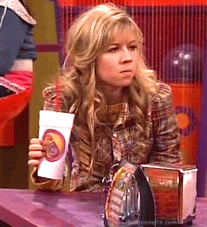 Sam glares as she crushes the Styrofoam cup she&#x27;s holding in her hand, causing the soda to spill out the side, on iCarly