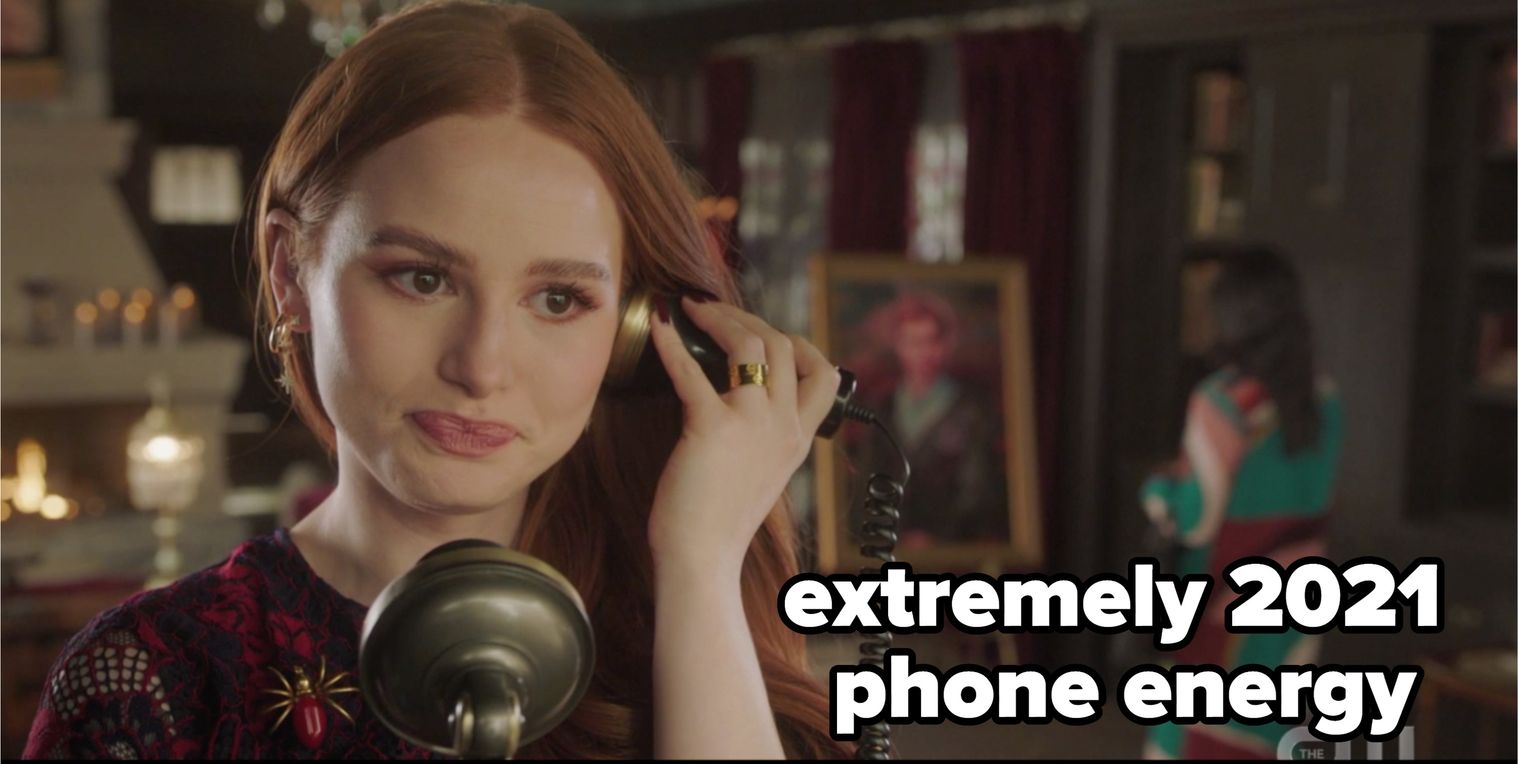 Cheryl with a rotary phone with the caption &quot;extremely 2021 phone energy&quot; 