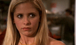 Buffy narrows her eyes as the camera zooms in on her face on Buffy the Vampire Slayer